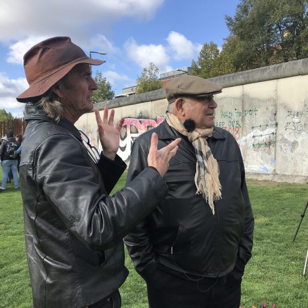 Guy Spiller & anti-apartheid activist Ronald Kasrils view remnants of the Berlin Wall as part of the GDR Exhibit.