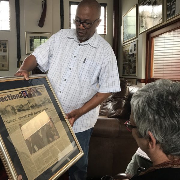 Bea Roberts interviewing Dr Khulu Mbatha at his home in Pretoria for the Liliesleaf exhibition on German Democratic Republic solidarity, 2018.
